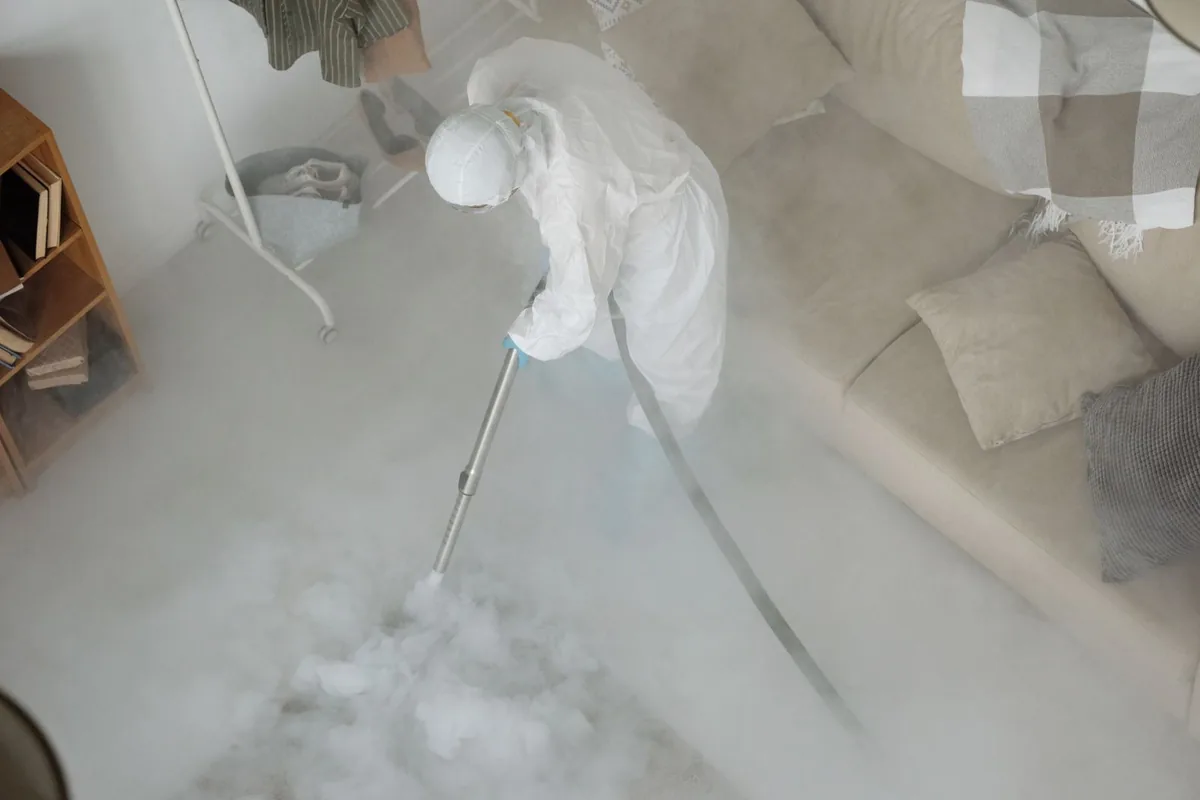 Biohazard cleanup technician in protective equipment, St. Andrews, SC